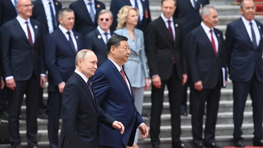 Russian President Vladimir Putin attends a welcome ceremony with Chinese President Xi Jinping outside the Great Hall of the People in Beijing, China1715862172.jpg